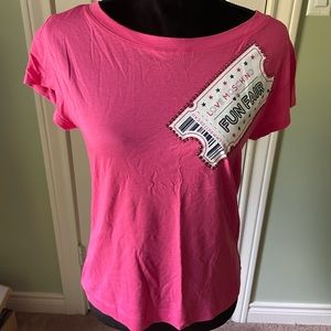 Pink Moschino FUN FAIR tee.